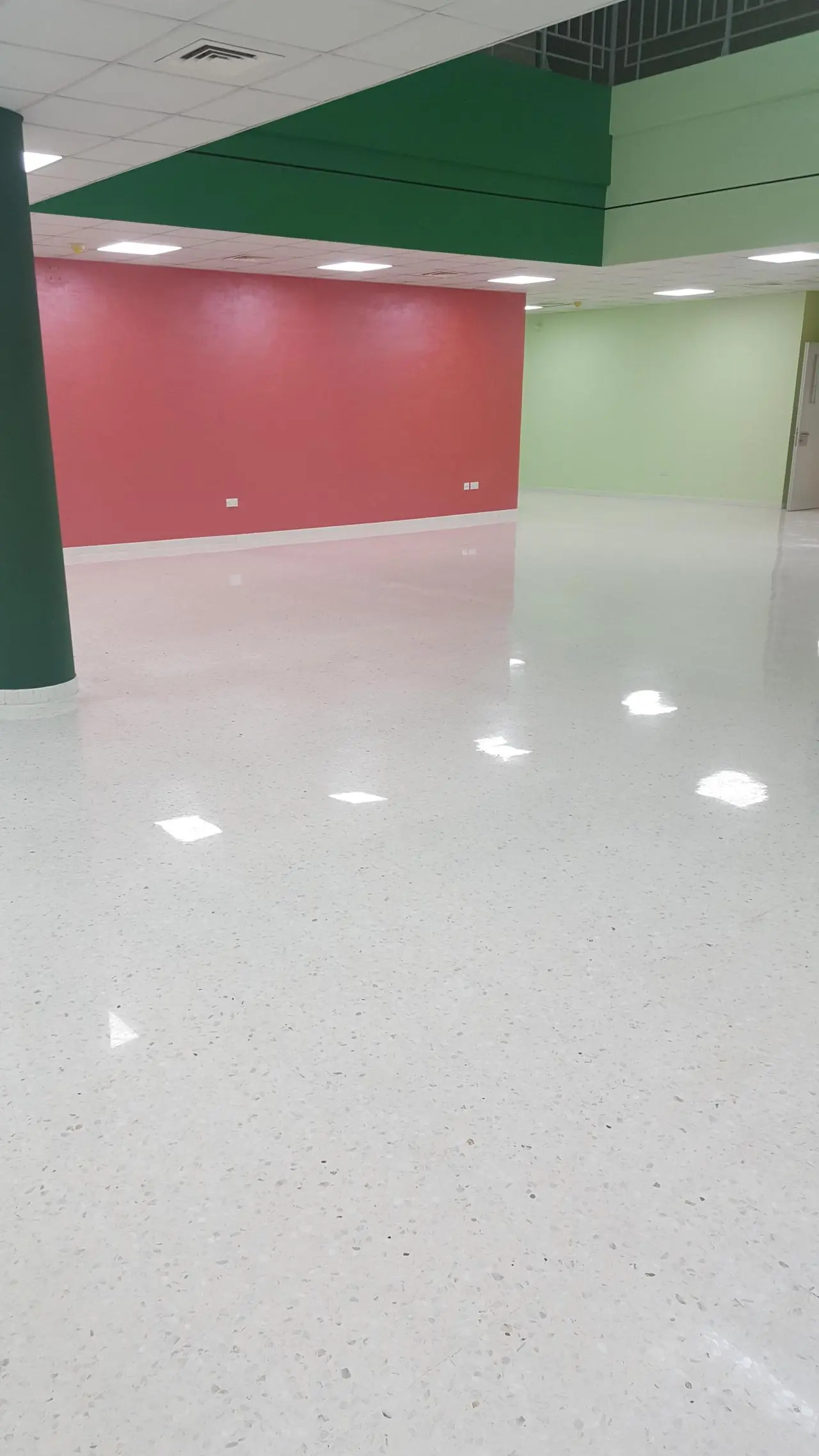 Professional mosaic floor polishing and restoration completed at the Dubai American Academy campus.